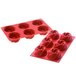 A red silicone mold with six rose-shaped cavities.
