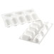 A white silicone baking mold with eight rectangular compartments.