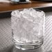 A glass with ice from a Hoshizaki countertop ice maker.