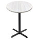 A white Holland Bar Height Table with a white ash wood top and black cross base.