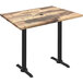 A Holland Bar Stool rustic wood laminate bar height table with a black end column base.