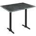 A Holland Bar Stool black steel and wood laminate bar height table with an end column base.