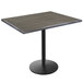 A Holland Bar Stool EnduroTop table with a black base and charcoal wood laminate top.