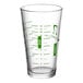 A 16 oz. mixing glass with a measuring cup on it and green WebstaurantStore logo.