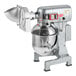 An Avantco commercial stand mixer with standard accessories and a silver bowl attachment.