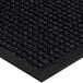 A close-up of a black Lavex waffle weave entrance mat with a black border.