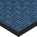 A close up of a navy blue Lavex parquet entrance mat with a black border.