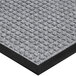 A gray Lavex waffle entrance mat with a black border.