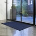Lavex Janitorial Water Absorbent Blue Waffle Indoor Entrance Mat - 3/8" Thick Main Thumbnail 3