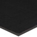 A close up of a black Lavex Plush solid black entrance mat.