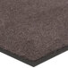 A brown Lavex Olefin carpet mat with a black border.