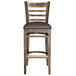A Lancaster Table & Seating wood ladder back bar stool with a dark brown vinyl seat detached.