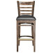 A Lancaster Table & Seating wooden bar stool with black vinyl seat and ladder back.