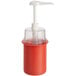 A red plastic Steril-Sil condiment dispenser with a white pump.