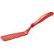 A Linden Sweden red high-heat silicone spatula with perforations on the turner end.