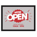 A close up of a red and white E-Z Up rectangle window decal with text that says "We Are Open"