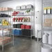 Steelton chrome wire shelving in a warehouse with boxes on the floor.