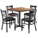 A Lancaster Table & Seating butcher block table in brown with four black chairs.