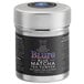 A silver tin of Wild Hibiscus Butterfly Pea Flower Blue Matcha Tea Powder with a black label.
