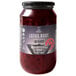 A jar of Wild Hibiscus Lotus Root in Hibiscus and Ginger Syrup with a label.