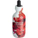 A bottle of Wild Hibiscus Floral Extract with a red cap and dropper containing a hibiscus flower.