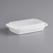 A white rectangular plastic Choice microwavable container with a lid.