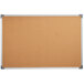 A Dynamic by 360 Office Furniture 36" x 24" cork board with aluminum frame.