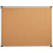 A Dynamic by 360 Office Furniture 60" x 48" cork board with metal frame.