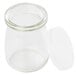 A clear glass jar with a plastic lid.