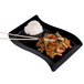 A black Fineline plastic luncheon plate with white rice and chopsticks.