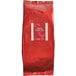 A red bag of Bossen Assam Black Loose Leaf Tea.