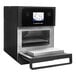 A black and silver Merrychef eikon e1s high speed countertop oven with a white and blue screen.