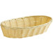 A Vollrath natural-colored plastic rattan bread basket on a white background.