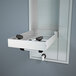 A Guardian stainless steel recess mounted eye and face wash station with black handles.