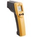 A close-up of a yellow and black CDN digital infrared thermometer.