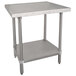 An Advance Tabco stainless steel work table with a stainless steel shelf.