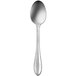 A close-up of a Delco Rhodes stainless steel teaspoon with a white background.