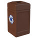A brown Commercial Zone recycling bin with a white recycle symbol and a blue mixed recycling slot.