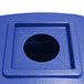 A blue plastic container with a round hole in the top.