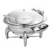 A silver stainless steel Walco Idol round chafer with a metal lid on a table.