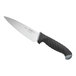 A Schraf chef knife with a black handle.