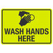 A yellow and black sign with black text and a hand washing
