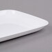 A white rectangular Sabert polystyrene tray.