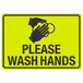A yellow sign with black text and hands washing.