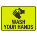A yellow and black reflective decal with the words "Wash Your Hands" and a hand washing icon.