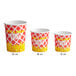 A group of red and white Choice paper French fry cups with yellow text.