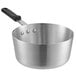 A silver aluminum sauce pan with a black silicone handle.