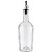 A clear glass Tablecraft oil and vinegar bottle with a stainless steel stopper.