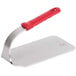 A Vollrath steak weight with a red silicone handle on a white background.