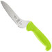 A Mercer Culinary Ultimate White bread knife with a green handle.